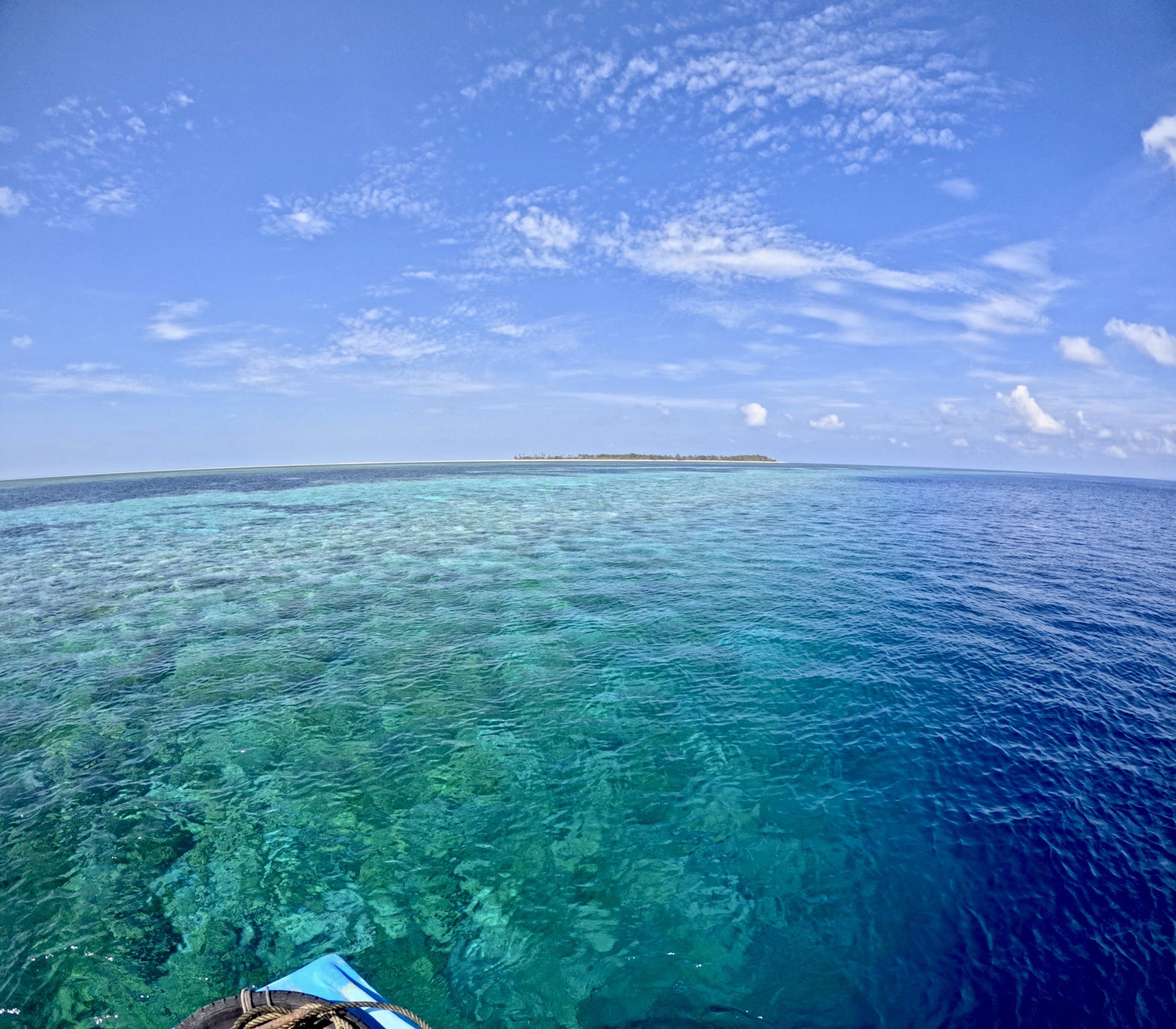 Clear turquoise water over a shallow reef top